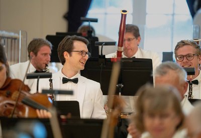 2024 Mozart Mitchell_Khun_with_orchestra_BAnner1