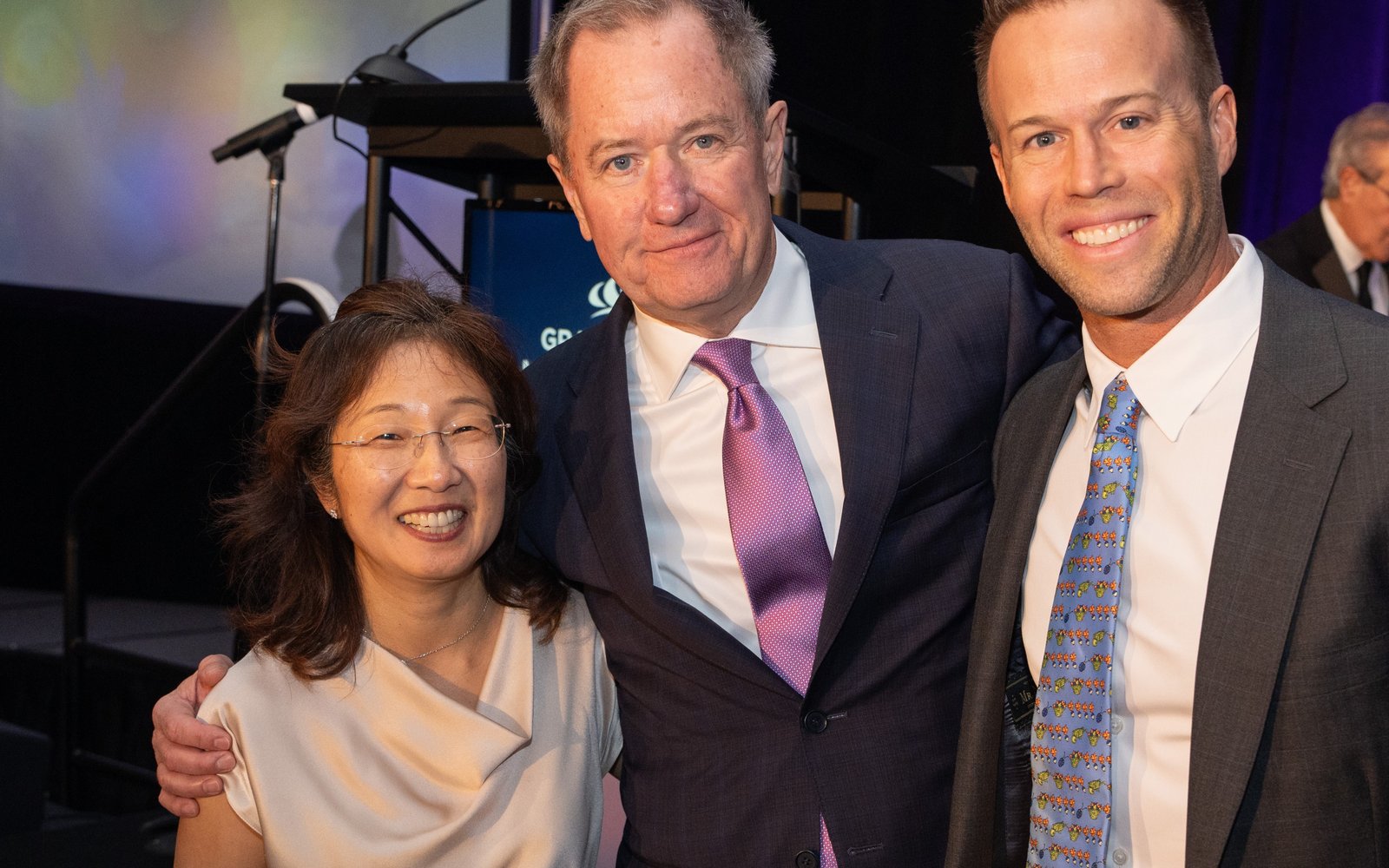 Amy Lee Boonstra, Stephen Smith of Amsted Industries, and Courtney Reum