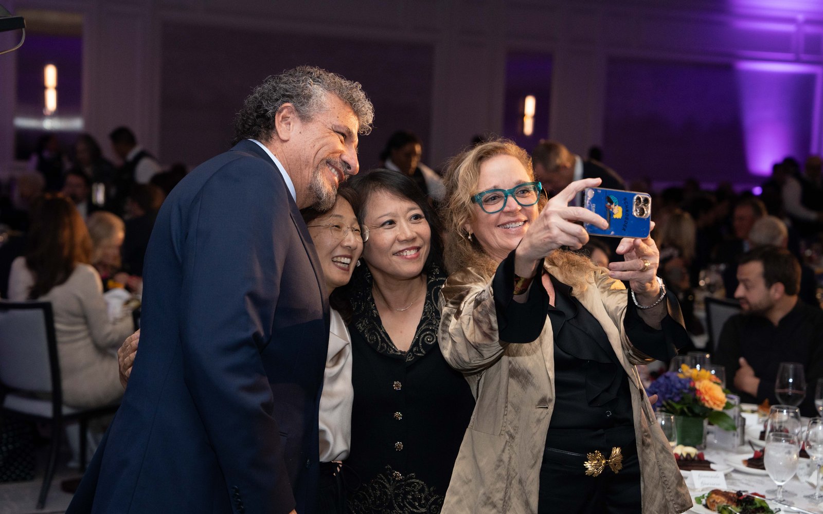 Giancarlo Guerrero, Festival Artistic Director and Principal Conductor, Amy Lee Boonstra, Advocate for the Arts Award honoree, with friends